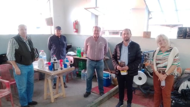 Arturo Jorge Videla, Abel Zenklusen con las autoridades de la Sociedad Rural de Rafaela