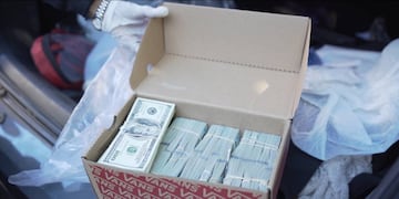 Parte del efectivo en moneda estadounidense había sido escondido en cajas dentro del baúl de un auto de alta gama.