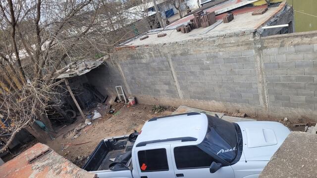 Una de las camionetas robadas estaba escondida en una vivienda. (Policía)