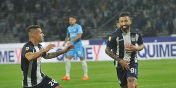 Carlos Auzqui y Michael Santos. Razones para que Talleres se ilusione en la recta final (Javier Ferreyra).