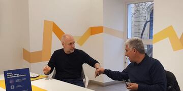 Claudio Poggi con Larreta