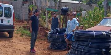 Unas 120 familias recibieron mangueras en Puerto Iguazú.