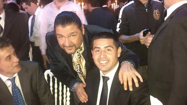 Fabio Cuggini junto a Juan Román Riquelme