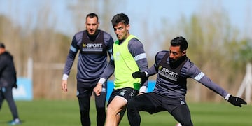 Belgrano y una imagen del entrenamiento de este miércoles en su predio. (Prensa Belgrano).