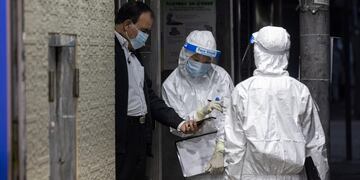 Hisopados en China. (EFE)