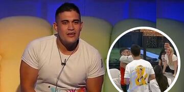 El beso del "negro Onty" y una compañera de reality.