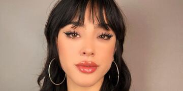 A puro naranja y camuflado, Belén Negri posó frente al espejo y se llevó todas las miradas.