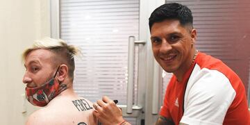 Matías Ribet de Arroyito junto a Enzo Pérez