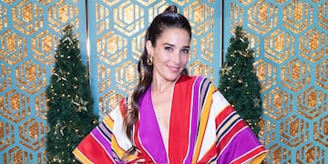 Juanita Viale condució ayer el último programa del año de "La Noche de Mirtha", con un vestido amarillo.