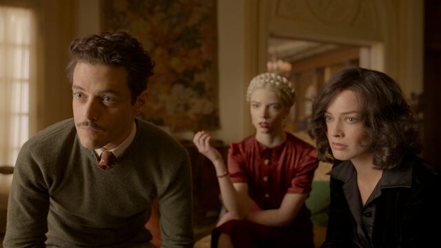 (L-R): Rami Malek, Anya Taylor-Joy, and Margot Robbie in 20th Century Studios' AMSTERDAM. Photo courtesy of 20th Century Studios. © 2022 20th Century Studios. All Rights Reserved.