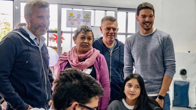 Gainza y Frigerio en una actividad en un barrio de Paraná.