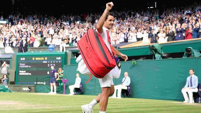 Roger Federer retirandose del All England ovacionado. (DPA)