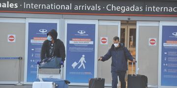 Arribo de pasajeros en el Aeropuerto Internacional de Ezeiza.