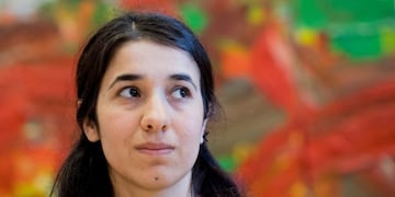 (FILES) In this file photo taken on March 9, 2017, Yazidi human rights activist Nadia Murad (L) speaks with lawyer Amal Clooney at an event titled \