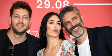 Argentinian filmmaker Gonzalo Tobal, Argentinian actors Lali Esposito and Leonardo Sbaraglia pose during a photocall for 'Acusada' during the 75th annual Venice International Film Festival, in Venice, Italy\u002E
