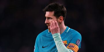 Barcelona's Lionel Messi looks on duringVthe Champion's League round of 16, first leg soccer match between Paris Saint Germain and Barcelona at the Parc des Princes stadium in Paris, Tuesday, Feb. 14, 2017. PSG won the match 4-0. (AP Photo/Francois Mori)