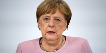 29 June 2019, Japan, Osaka: German Chancellor Angela Merkel speaks during a press conference with Minister of Finance Olaf Scholz (Not Pictured) on the conclusion of the G20 summit\u002E Photo: Bernd von Jutrczenka/dpa