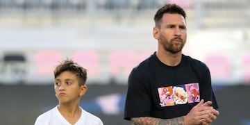 Thiago y Lionel Messi