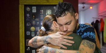 Juan Jose Herrera, 35, the son of Ismael Enrique Arciniegas, who was arrested in China for drug trafficking, hugs a family member on February 27, 2017, in Cali, Valle del Cauca department, Colombia. nArciniegas was arrested in China in mid-2010 and sentenced to death after confessing that he had smuggled nearly four kilos of cocaine into the country. On Monday, the Colombian government