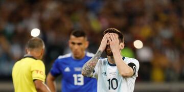 Argentina's Lionel Messi touches his face before scoring from a penalty spot against Paraguay during a Copa America Group B soccer match at the Mineirao stadium in Belo Horizonte, Brazil, Wednesday, June 19, 2019\u002E (AP Photo/Natacha Pisarenko)