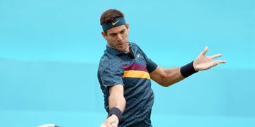 19 June 2019, England, London: Argentins tennis player Juan Martin del Potro in action against Canada's Denis Shapovalov during their men's singles round of 32 match of the Queen's Club Championships tennis tournament, at the Queen's Club\u002E Photo: Steven Paston/PA Wire/dpa