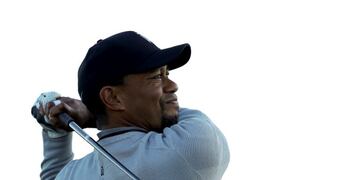 FILE - In this Jan. 25, 2017, file photo, Tiger Woods watches his tee shot on the fifth hole of the north course during the Pro-Am event of the Farmers Insurance Open golf tournament, in San Diego. Police say golf great Tiger Woods has been arrested on a DUI charge in Florida. The Palm Beach County Sheriff's Office says on its website that Woods was booked into a county jail around 7 a.m. on Monday, May 29, 2017. (AP Photo/Gregory Bull, File)