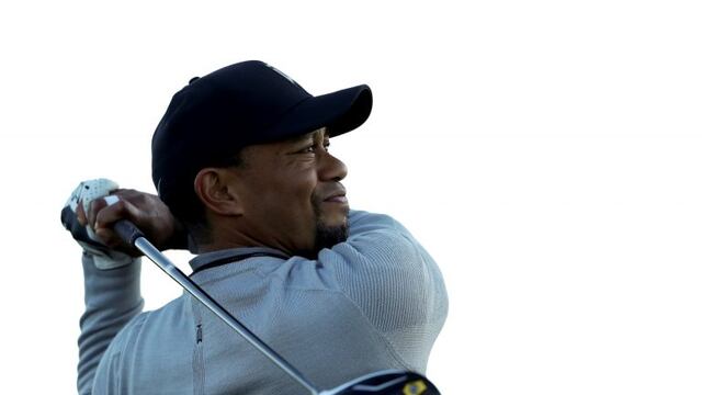 FILE - In this Jan. 25, 2017, file photo, Tiger Woods watches his tee shot on the fifth hole of the north course during the Pro-Am event of the Farmers Insurance Open golf tournament, in San Diego. Police say golf great Tiger Woods has been arrested on a DUI charge in Florida. The Palm Beach County Sheriff's Office says on its website that Woods was booked into a county jail around 7 a.m. on Monday, May 29, 2017. (AP Photo/Gregory Bull, File)
