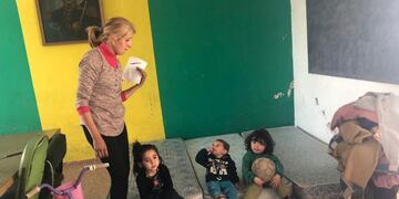 Madre y sus hijos\u002E