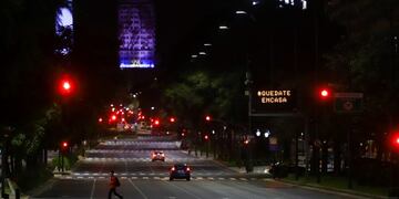 A man walks on the stret as Argentine President Alberto Fernandez announced an extension of the lockdown it has imposed as a measure to control the spread of the coronavirus disease (COVID-19), in Buenos Aires, Argentina April 10, 2020\u002E REUTERS/Matias Baglietto