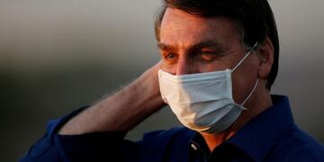 Brazil's President Jair Bolsonaro is seen at the Alvorada Palace, amid the coronavirus disease (COVID-19) outbreak, in Brasilia, Brazil, July 18, 2020\u002EREUTERS/Adriano Machado