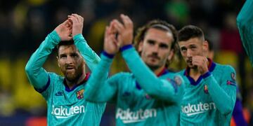 Lionel Messi y Antoine Griezmann (Foto: Sascha Schuermann/AFP)
