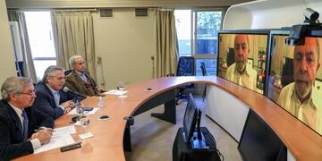 Handout photo released by Argentina's Presidency of President Alberto Fernandez (C) speaking with Brazilian former president Luiz Inacio Lula Da Silva, during an onlie meeting with Grupo de Puebla members, amid the pandemic outbreak of the new Coronavirus, COVID-19, in Buenos Aires, Argentina on April 10, 2020\u002E (Photo by ESTEBAN COLLAZO / PRESIDENCIA ARGENTINA / AFP) / RESTRICTED TO EDITORIAL USE - MANDATORY CREDIT \