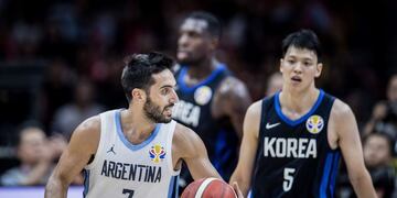 Facundo Campazzo (L) of Argentina dribbles the ball during the Basketball World Cup Group B game between Argentina and South Korea in Wuhan, Hubei province, on August 31, 2019\u002E (Photo by STR / AFP) / China OUT