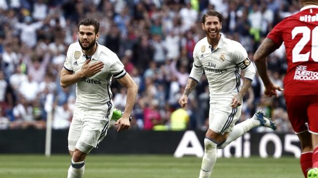 GRA407\u002E MADRID, 14/05/2017\u002E- Los defensas del Real Madrid, Nacho (i) y Sergio Ramos, celebran el primer gol del equipo madridista durante el encuentro correspondiente a la jornada 37 de primera divisiu00f3n, que disputan esta tarde frente al Sevilla en el estadio Santiago Bernabu00e9u, en Madrid\u002E EFE / Mariscal\u002E espau00f1a Sergio Ramos campeonato torneo liga espau00f1ola espau00f1ol futbol futbolistas partido real madrid sevilla
