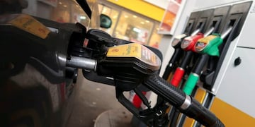 FILE PHOTO: A diesel fuel nozzle is seen attached to a car at a Shell petrol station in Berlin, Germany October 22, 2018\u002E REUTERS/Fabrizio Bensch/File Photo