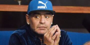 Argentinian retired professional footballer Diego Armando Maradona attends the Davis Cup World Group final singles match between Croatia and Argentina at the Arena hall in Zagreb, on November 25, 2016. / AFP PHOTO / STRINGER zagreb croacia diego armando m