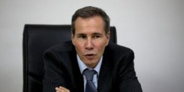 FILE - In this May 29, 2013 file photo, Alberto Nisman, the prosecutor investigating the 1994 bombing of the Argentine-Israeli Mutual Association community center, talks to journalists in Buenos Aires, Argentina. The country's top criminal tribunal on Thu