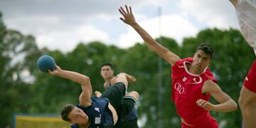 In this photo provided by the OIS/IOC, Nicolas Dieguez of Argentina attempts a throw during the Beach Handball Mens Tournament Bronze Medal Match between Argentina and Croatia at the Beach Handball Arena, during the Youth Olympic Games in Buenos Aires, Argentina, Saturday, Oct\u002E 13, 2018\u002E (Ian Walton/OIS/IOC via AP)