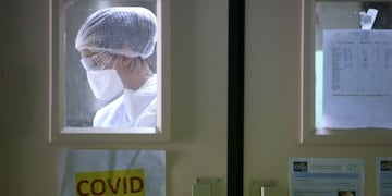 A nurse wearing protective gear is at work in the COVID-19 area, in the Eugenie Hospital in Ajaccio, on the French Mediterranean island of Corsica, on April 23, 2020, on the thirty-eighth day of a lockdown in France aimed at curbing the spread of the COVID-19 disease, caused by the novel coronavirus\u002E - A message, a drawing or a picture slipped into the coffin, letters from caretakers to the families\u002E\u002E\u002E Several \