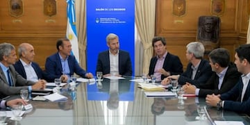 Gutiérrez con Frigerio