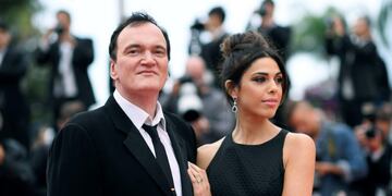 FILE - In this May 18, 2019 file photo, film director Quentin Tarantino and his wife Daniela Pick pose for photographers upon arrival at the premiere of the film \
