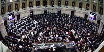 Handout photo released by the Argentinian Senate Press Office showing a general view of the plenary while Argentine President Mauricio Macri (bottom-center) delivers a speech next to Vice-President Gabriela Michetti during the inauguration of the 137th period of ordinary sessions at the Congress in Buenos Aires, Argentina on March 1, 2019\u002E (Photo by PABLO GRINBERG / Prensa Senado / AFP) / RESTRICTED TO EDITORIAL USE - MANDATORY CREDIT \
