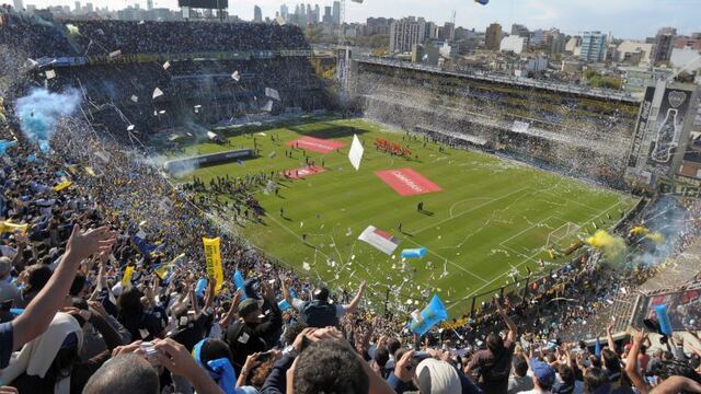FILE - In this May 4, 2008 file photo, Boca Juniors fans cheer prior to an Argentine soccer league game against River Plate at La Bombonera stadium in Buenos Aires\u002E Peruvian football officials have on Monday, Sept\u002E 11, 2017, asked FIFA to shift the World Cup qualifier against Argentina next month from Boca Junior's Bombonera stadium\u002E (AP Photo/Daniel Luna, File)