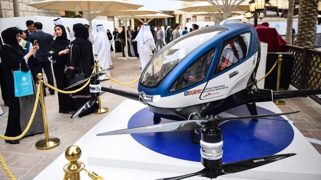 A model of the EHang 184 autonomous aerial vehicle is displayed at the World Government Summit 2017 in Dubai's Madinat Jumeirah on February 13, 2017. / AFP PHOTO / STRINGER Dubai  drones taxis EHang 184