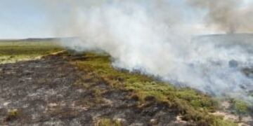Aerial view of a wildfire in La Adela, La Pampa province, Argentina on January 05, 2016. nFirefighters in Argentina are struggling to control a series of wildfires that have devastated nearly one million hectares (2.5 million acres) of the country's famous pampas, or plains, officials said Thursday. / AFP PHOTO / EITAN ABRAMOVICH