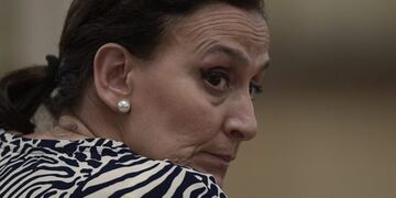 Argentina's Vice-President Gabriela Michetti gestures while President Mauricio Macri delivers a press conference at the Casa Rosada in Buenos Aires on February 16, 2017.rnAmong other topics he mentioned, Macri announced that he had ordered the negotiation