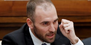 FILE PHOTO: Argentina's Economy Minister Martin Guzman gestures during a conference hosted by the Vatican on economic solidarity, at the Vatican, February 5, 2020\u002E REUTERS/Remo Casilli/File Photo