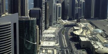 (FILES) This file photo taken on October 4, 2012 shows skyscrapers in the Qatari capital Doha.nGulf states on June 5, 2017, cut diplomatic ties with neighbouring Qatar and kicked it out of a military coalition, less than a month after US President Donald Trump visited the region to cement ties with powerhouse Saudi Arabia.nIn the region's most serious diplomatic crisis in years, Qatar's Gulf neighbours Riyadh, Bahrain and the United Arab Emirates as well as Egypt all announced they were severing ties with gas-rich Qatar. / AFP PHOTO / Patrick BAZ