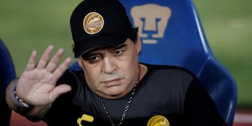 Dorados' head coach Diego Maradona waves as he takes his seat on the bench ahead of the start of Dorados' Copa MX quarterfinal match against Pumas at Olympic University Stadium in Mexico City, Tuesday, March 12, 2019\u002E (AP Photo/Rebecca Blackwell) mexico diego armando maradona futbol campeonato mexico liga mexicana futbol futbolistas dorados pumas
