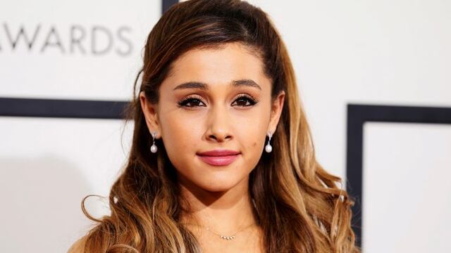 FILE PHOTO: Singer Ariana Grande arrives at the 56th annual Grammy Awards in Los Angeles, California January 26, 2014.     REUTERS/Danny Moloshok/File Photo